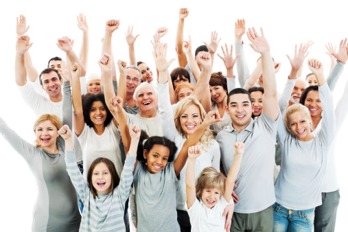 Large group of a happy people with raised hands.